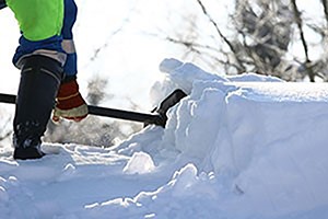 Image of person shoveling snow